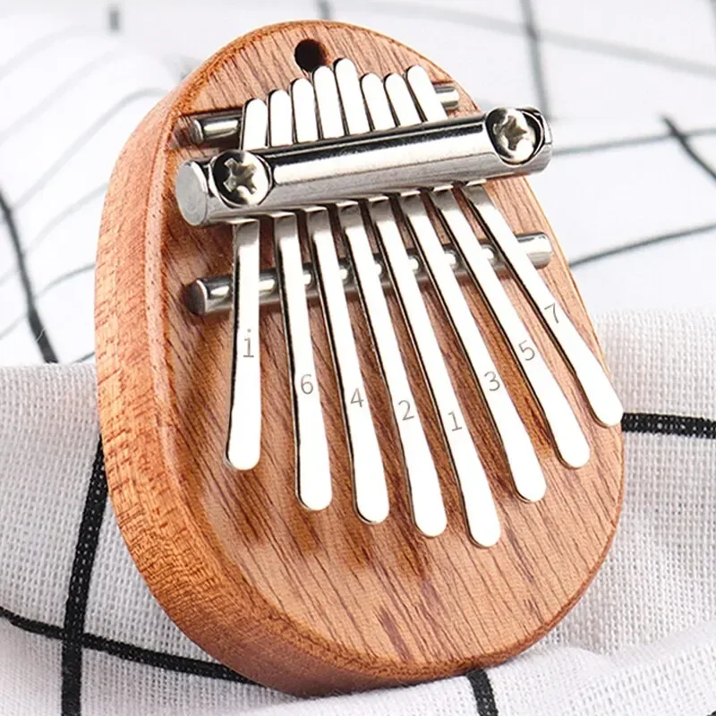 بيانو إصبع خشبي صغير بـ 8 نغما - مراجعة Kalimba Thumb Piano وسعره