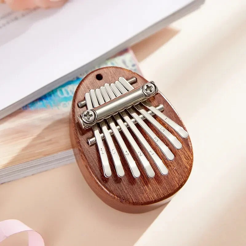 بيانو إصبع خشبي صغير بـ 8 نغما - مراجعة Kalimba Thumb Piano وسعره