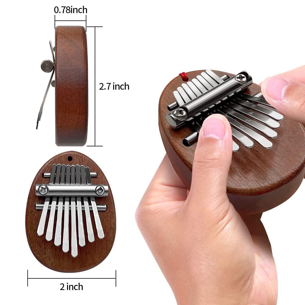 كاليمبا صغيرة محمولة من الخشب  - مراجعة Kalimba Thumb Piano وسعره